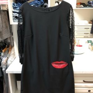 Little black dress with hot red lip pocket